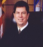 Senior Judge  John  McBride 